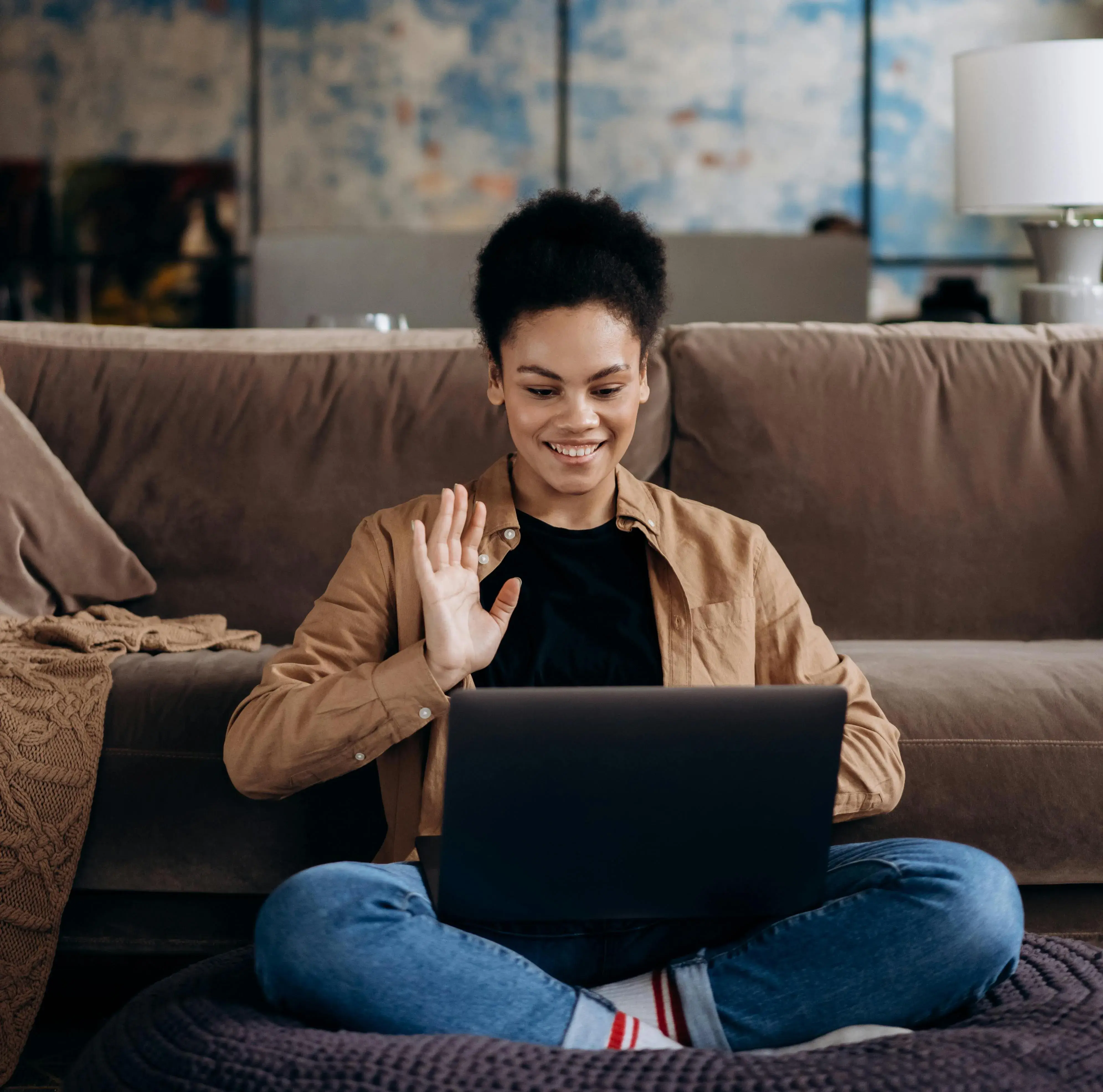 Woman working from couch