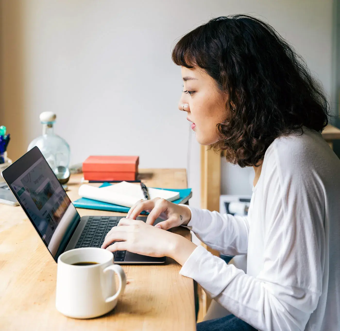 Woman working having coffee